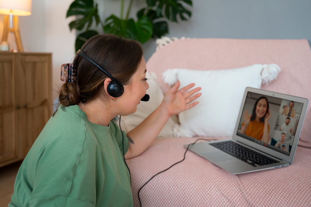 https://45185269.fs1.hubspotusercontent-na1.net/hubfs/45185269/woman-having-video-call-home-laptop-with-headset.jpg
